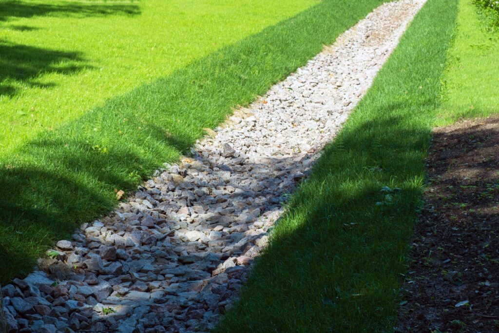 Newly installed residential drainage system in Ocala, FL preventing yard flooding and water pooling